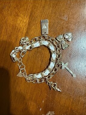 Guess Rose Gold-Tone Multi-Charm Bracelet with White Ribbon Weave